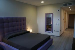 Postel nebo postele na pokoji v ubytování Blue Hotel