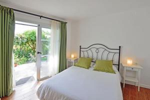 Katil atau katil-katil dalam bilik di Apartamentos Adjovimar +71 gambar