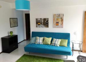 Foz do Arelho Beach Apartment "Blue" tesisinde bir oturma alanı