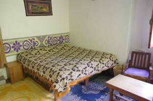 Postel nebo postele na pokoji v ubytování Orchard Huts