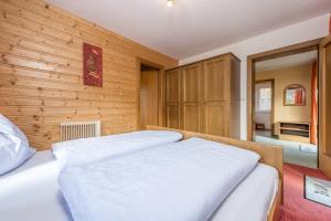 Voodi või voodid majutusasutuse Ski- und Wander Appartements Schiffer toas