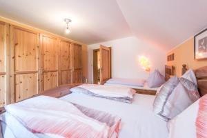 Voodi või voodid majutusasutuse Ski- und Wander Appartements Schiffer toas