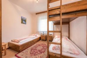 Voodi või voodid majutusasutuse Ski- und Wander Appartements Schiffer toas