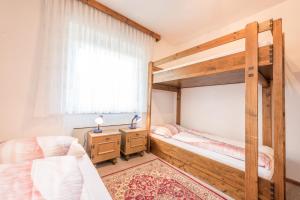 Voodi või voodid majutusasutuse Ski- und Wander Appartements Schiffer toas