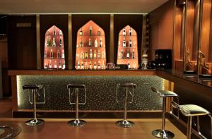 Zona de lounge sau bar la Suvarnabhumi Suite Hotel