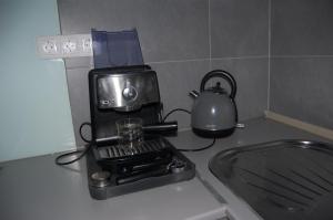 Łóżko lub łóżka w pokoju w obiekcie Apartman a Szentlélek u. -3ban