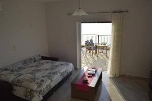 A bed or beds in a room at Sun Gazing Villas