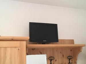 TV a/nebo společenská místnost v ubytování Santorsola Relax Hotel