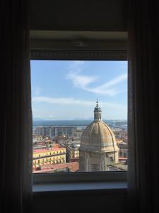 a view of a city from a window at Residenza Garibaldi in Naples