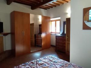 Postel nebo postele na pokoji v ubytování Agriturismo Conca Verde
