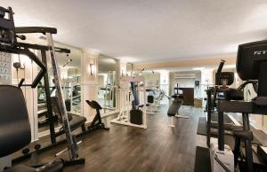 a gym with lots of treadmills and machines at Sea Crest Oceanfront Resort in Myrtle Beach