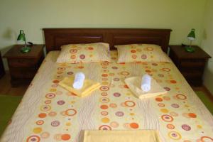מיטה או מיטות בחדר ב-Apartment Diana