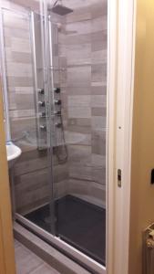 a shower with a glass door in a bathroom at l'arco di Sersa in Riccò del Golfo di Spezia +44 photos
