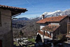a house with a view of a mountain at A casa mia in Meduno
