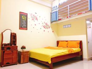 Giường trong phòng chung tại Pensee Guesthouse