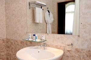 A bathroom at AZIMUT Hotel Rostov Veliky