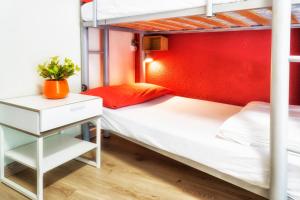 Postel nebo postele na pokoji v ubytování Itaca Hostel