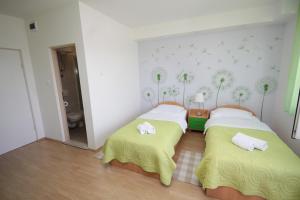 Posteľ alebo postele v izbe v ubytovaní City Center Accommodation