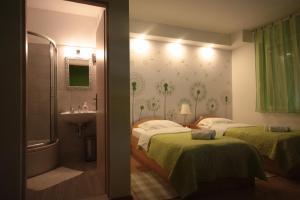 Posteľ alebo postele v izbe v ubytovaní City Center Accommodation