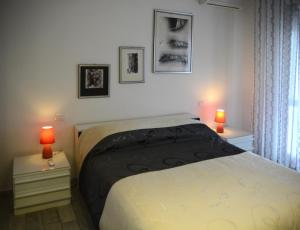 Ένα ή περισσότερα κρεβάτια σε δωμάτιο στο B&B Villa Garden
