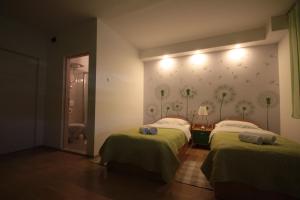 Posteľ alebo postele v izbe v ubytovaní City Center Accommodation