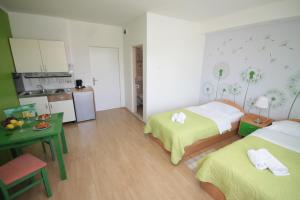 Posteľ alebo postele v izbe v ubytovaní City Center Accommodation