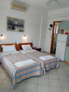 Posteľ alebo postele v izbe v ubytovaní Palmyra Beachfront Studios