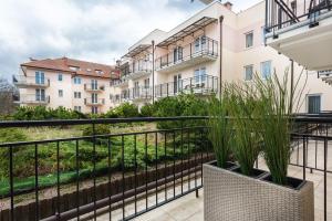 Balkón alebo terasa v ubytovaní Olymp 114 i 120 z basenem, sauną i jacuzzi w cenie