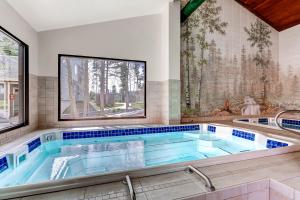 a large swimming pool in a house at Evergreen Condominiums by Keystone Resort in Keystone