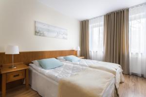 Posteľ alebo postele v izbe v ubytovaní Olymp 114 i 120 z basenem, sauną i jacuzzi w cenie + 32 fotografií