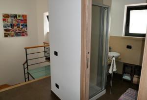 Postel nebo postele na pokoji v ubytování Aspromontando + 3 fotografie
