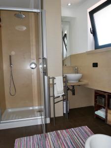 a bathroom with a shower and a sink at Aspromontando in Polistena