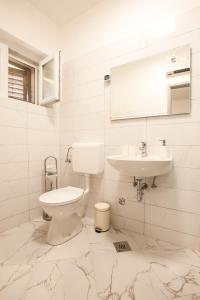 Kúpeľňa v ubytovaní Apartments Aria