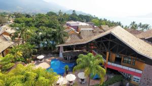 an aerial view of a resort with a swimming pool at Ilhabela Flat in Ilhabela
