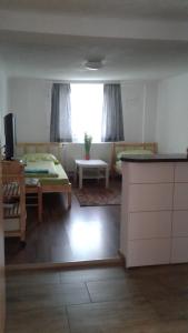 Katil atau katil-katil dalam bilik di Apartment don bosco
