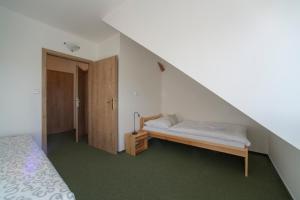 Letto o letti in una camera di Pernštejnův statek