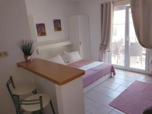 Posteľ alebo postele v izbe v ubytovaní Apartment Luna