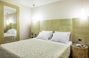 Postelja oz. postelje v sobi nastanitve Core Hotel