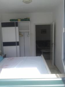 Postel nebo postele na pokoji v ubytování Apartments Subotic