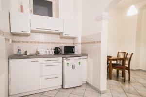 Kuchyň nebo kuchyňský kout v ubytování Ozone Private Rooms