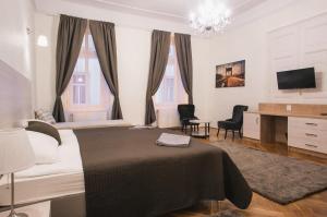 TV a/nebo společenská místnost v ubytování Ozone Private Rooms