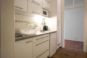 Kuchyň nebo kuchyňský kout v ubytování Ozone Private Rooms + 37 fotografií