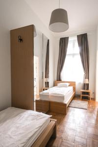 Postel nebo postele na pokoji v ubytování Ozone Private Rooms