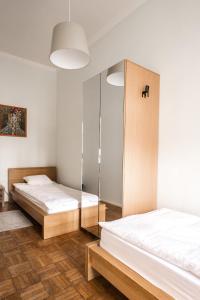 Postel nebo postele na pokoji v ubytování Ozone Private Rooms
