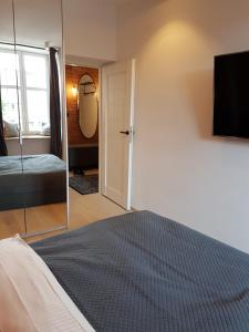 Posteľ alebo postele v izbe v ubytovaní Apartament Piwna 16 Gdańsk