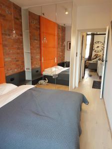 Posteľ alebo postele v izbe v ubytovaní Apartament Piwna 16 Gdańsk