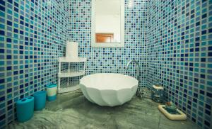 Un baño de Case Latanier