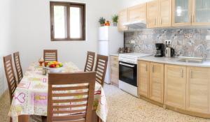 A kitchen or kitchenette at Aramis Boutique House