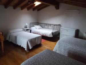 A bed or beds in a room at Casa Gorio Még 5 kép