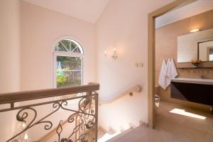 A bed or beds in a room at Villa Sunset